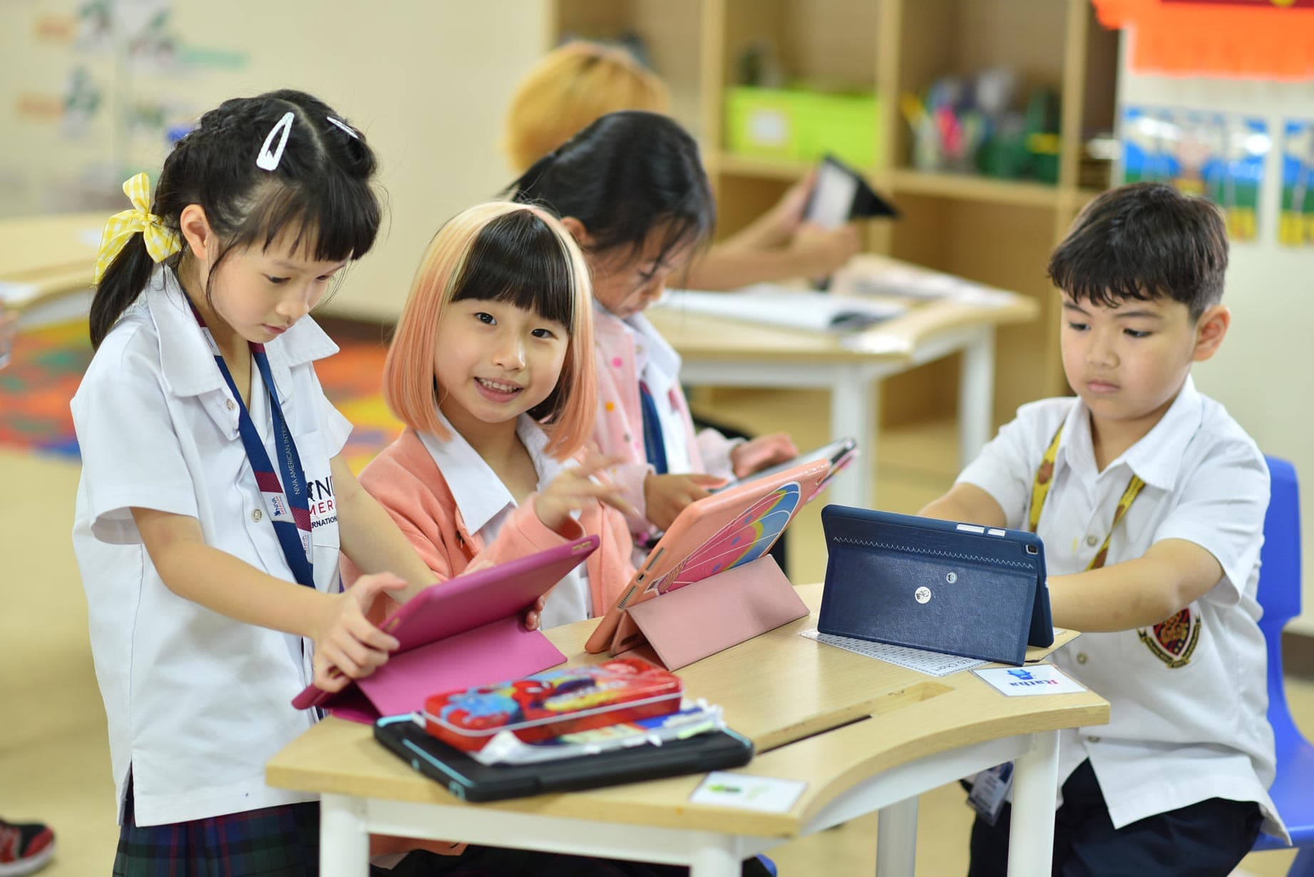 NIVA Classrooms - Elementary students smiling and having fun