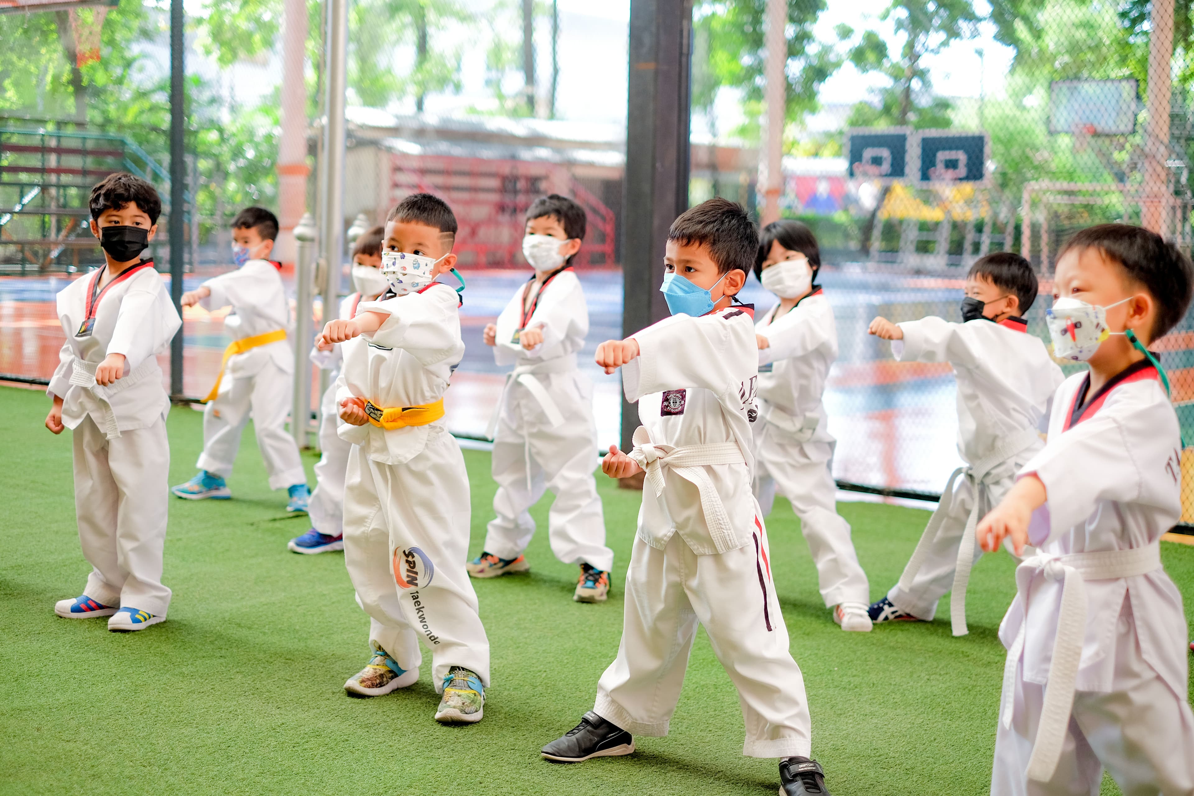 NIVA American International School kindergarten students learning tae kwon do (martial arts)