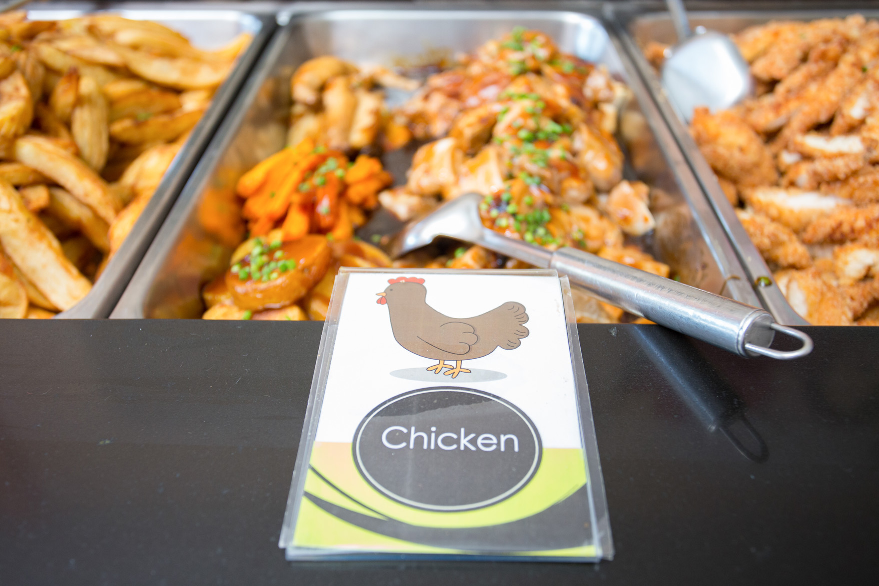 Chicken and vegetable dish at the canteen serving counter